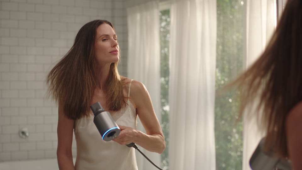 Finishing a hairstyle with the Nuvelle hair dryer