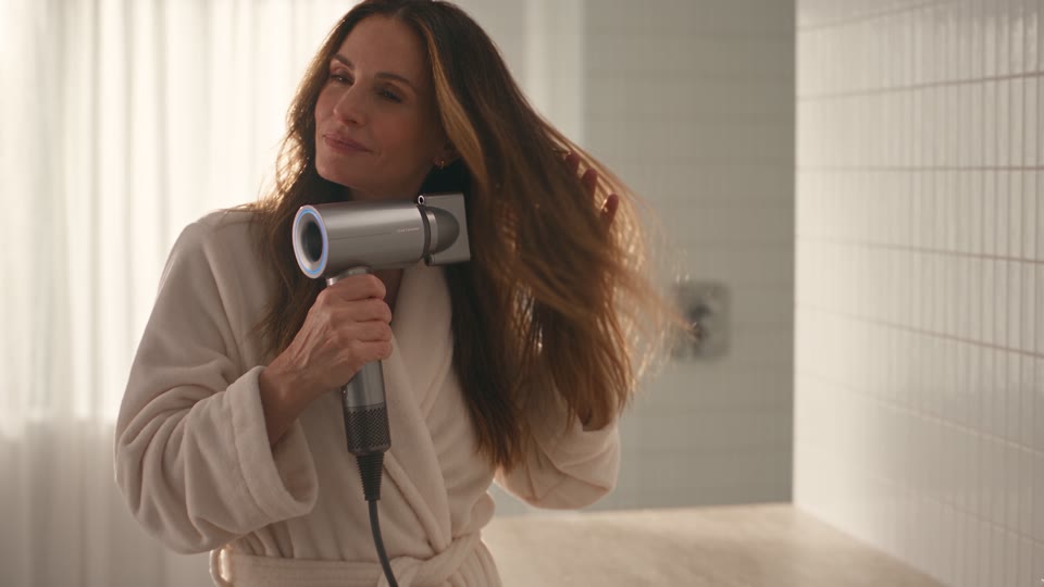 Drying hair with the Nuvelle hair dryer
